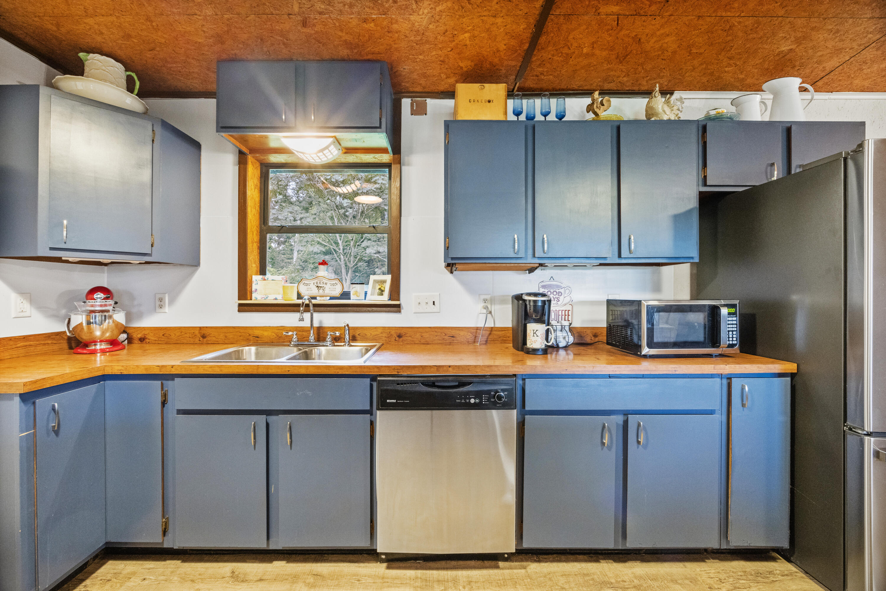 190 Peaden Bridge Road Baker, FL 32531 - Photo 21 of 73 a kitchen with stainless steel appliances granite countertop a sink a stove and a refrigerator