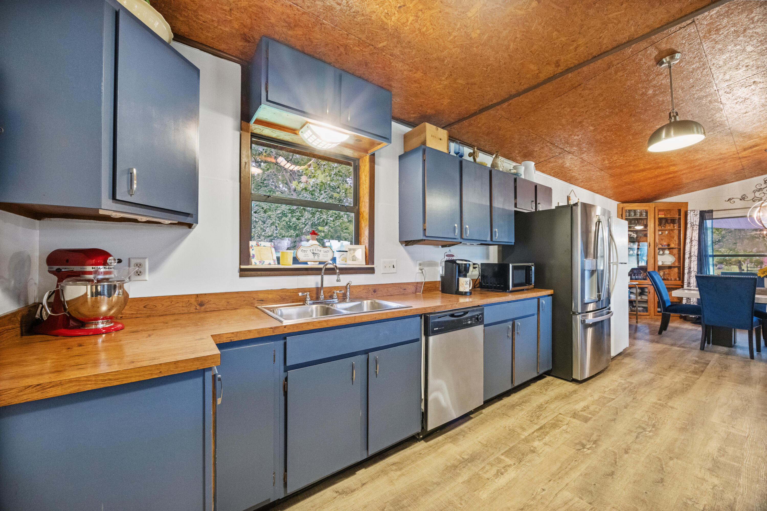 190 Peaden Bridge Road Baker, FL 32531 - Photo 24 of 73 a kitchen with stainless steel appliances granite countertop sink stove and refrigerator
