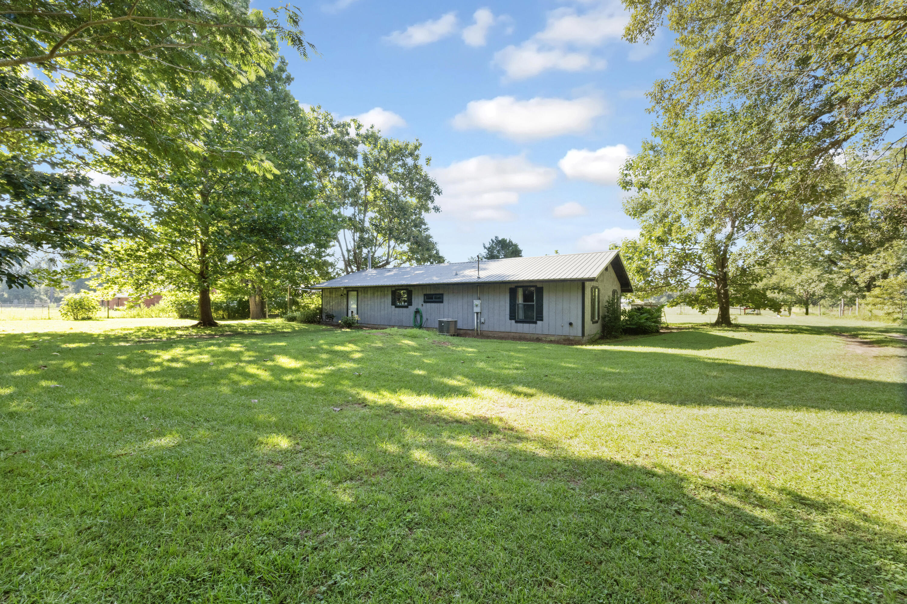 190 Peaden Bridge Road Baker, FL 32531 - Photo 35 of 73 a front view of house with yard and green space