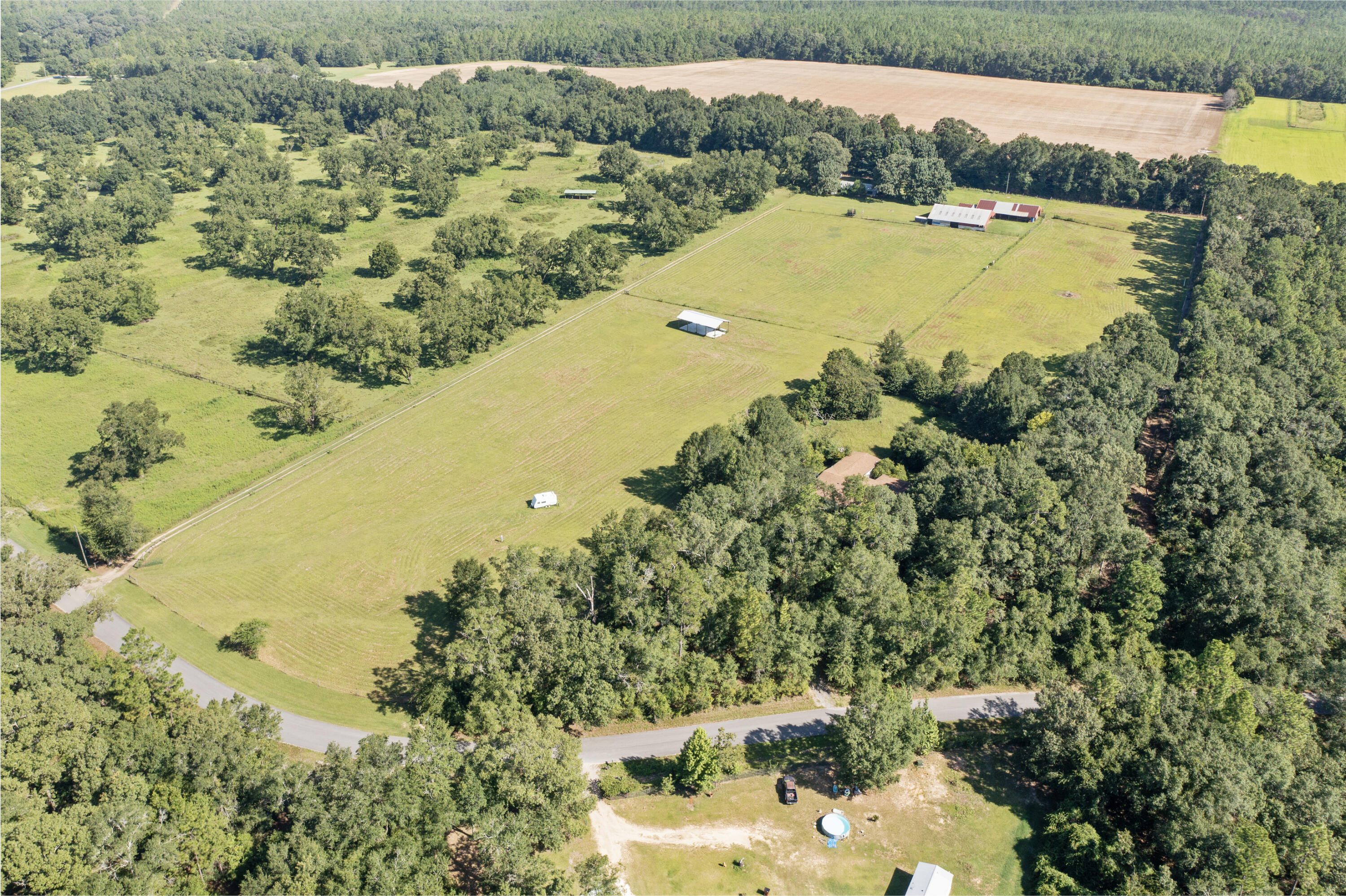 190 Peaden Bridge Road Baker, FL 32531 - Photo 67 of 73 a view of a lake with a mountain in the background