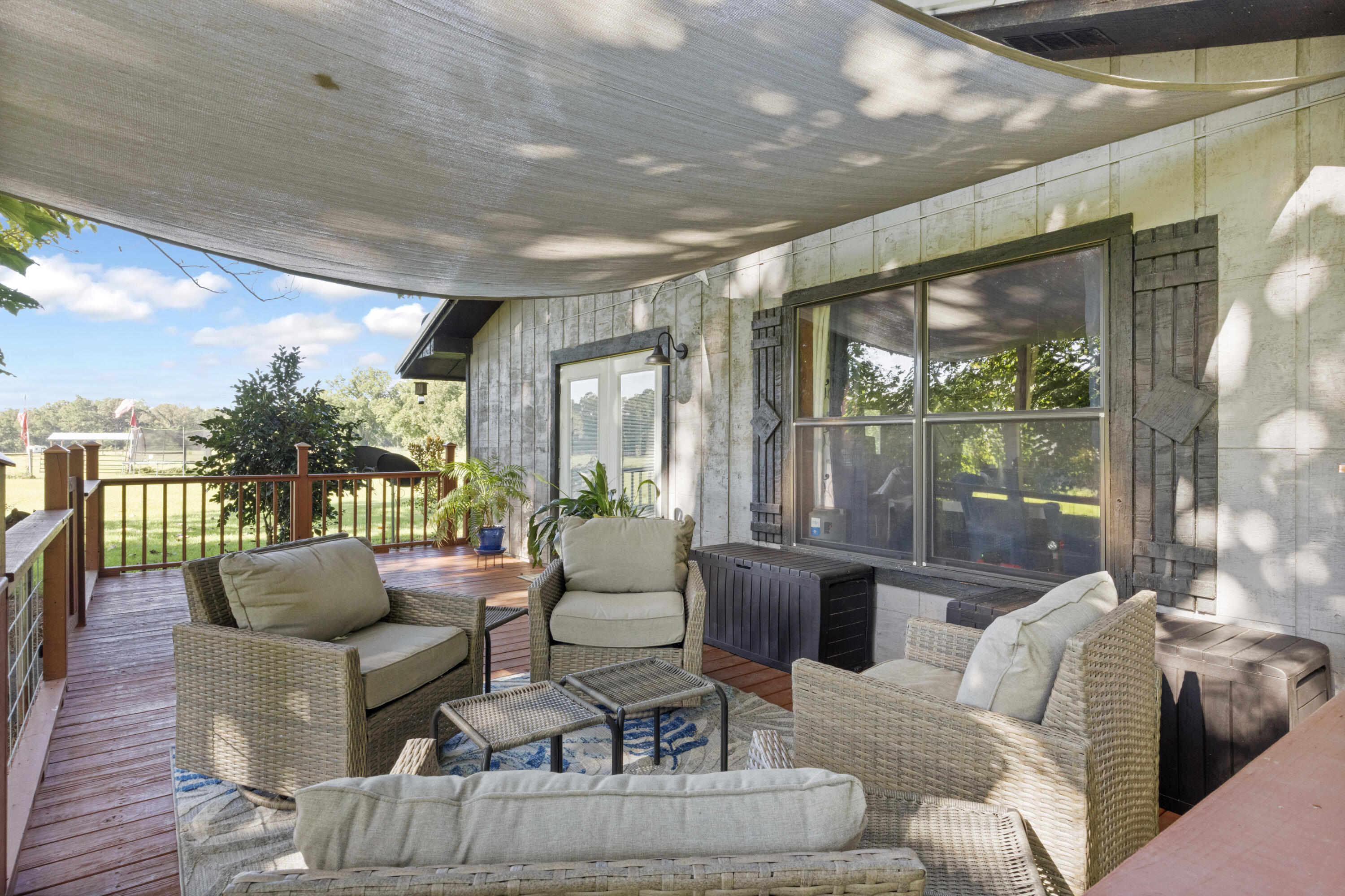 190 Peaden Bridge Road Baker, FL 32531 - Photo 7 of 73 a living room with furniture and a large window