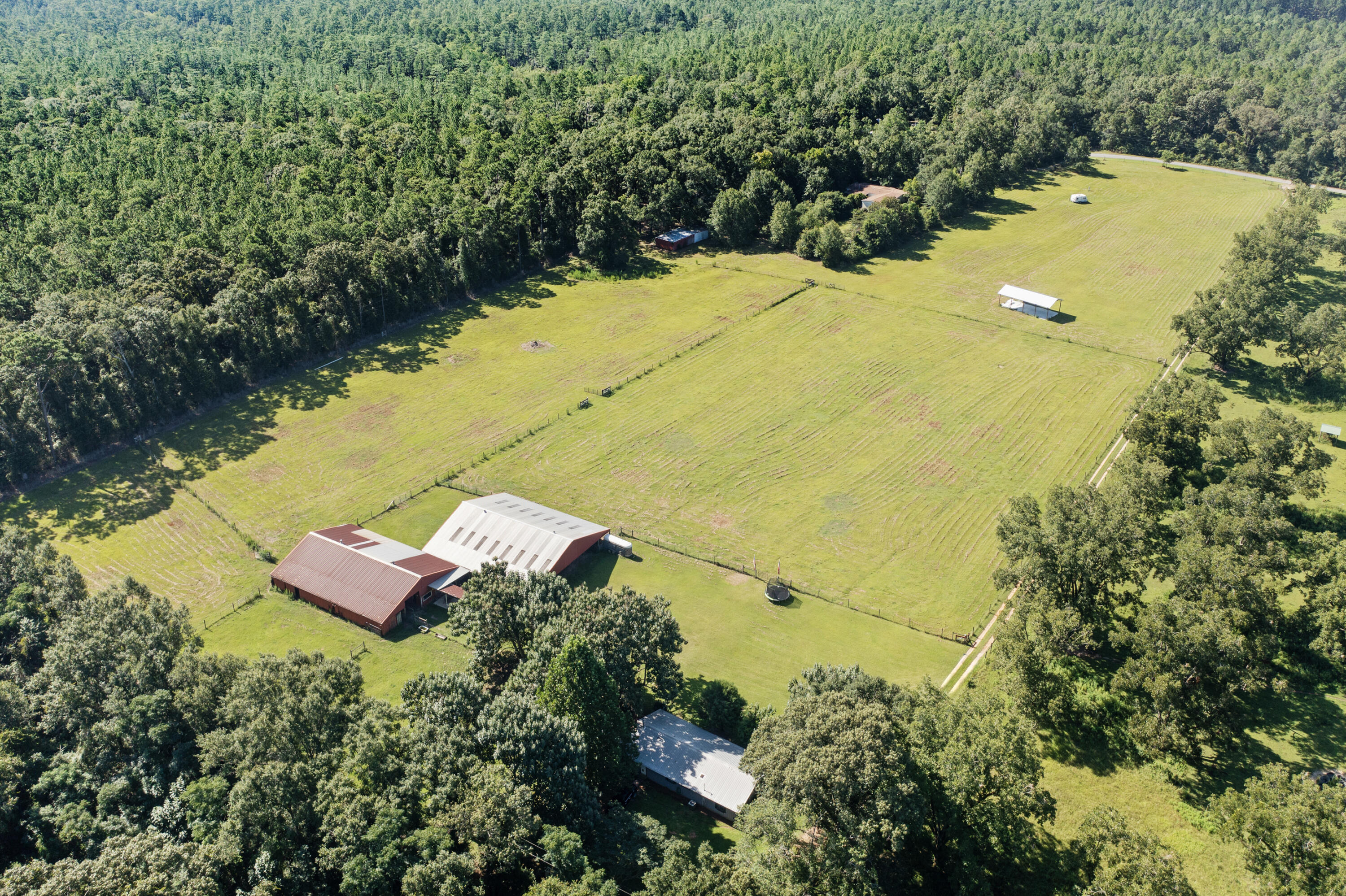190 Peaden Bridge Road Baker, FL 32531 - Photo 71 of 73 an aerial view of residential house with swimming pool and green space