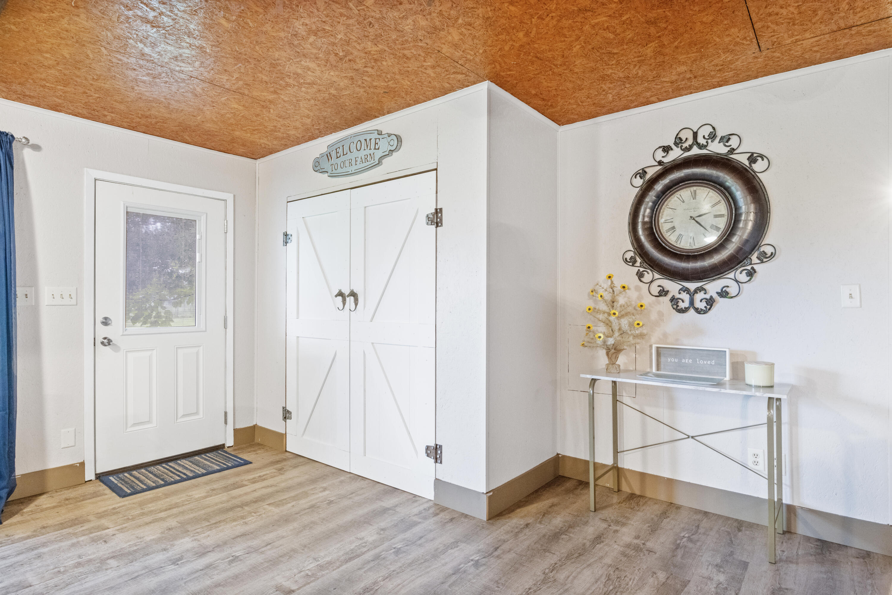 190 Peaden Bridge Road Baker, FL 32531 - Photo 8 of 73 a view of a storage & utility room with a window