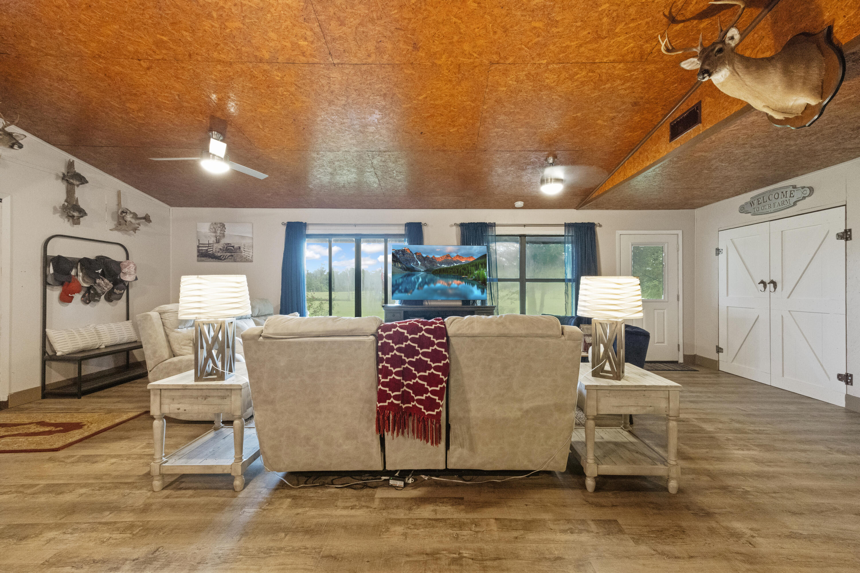 190 Peaden Bridge Road Baker, FL 32531 - Photo 10 of 73 a living room with furniture and a large window