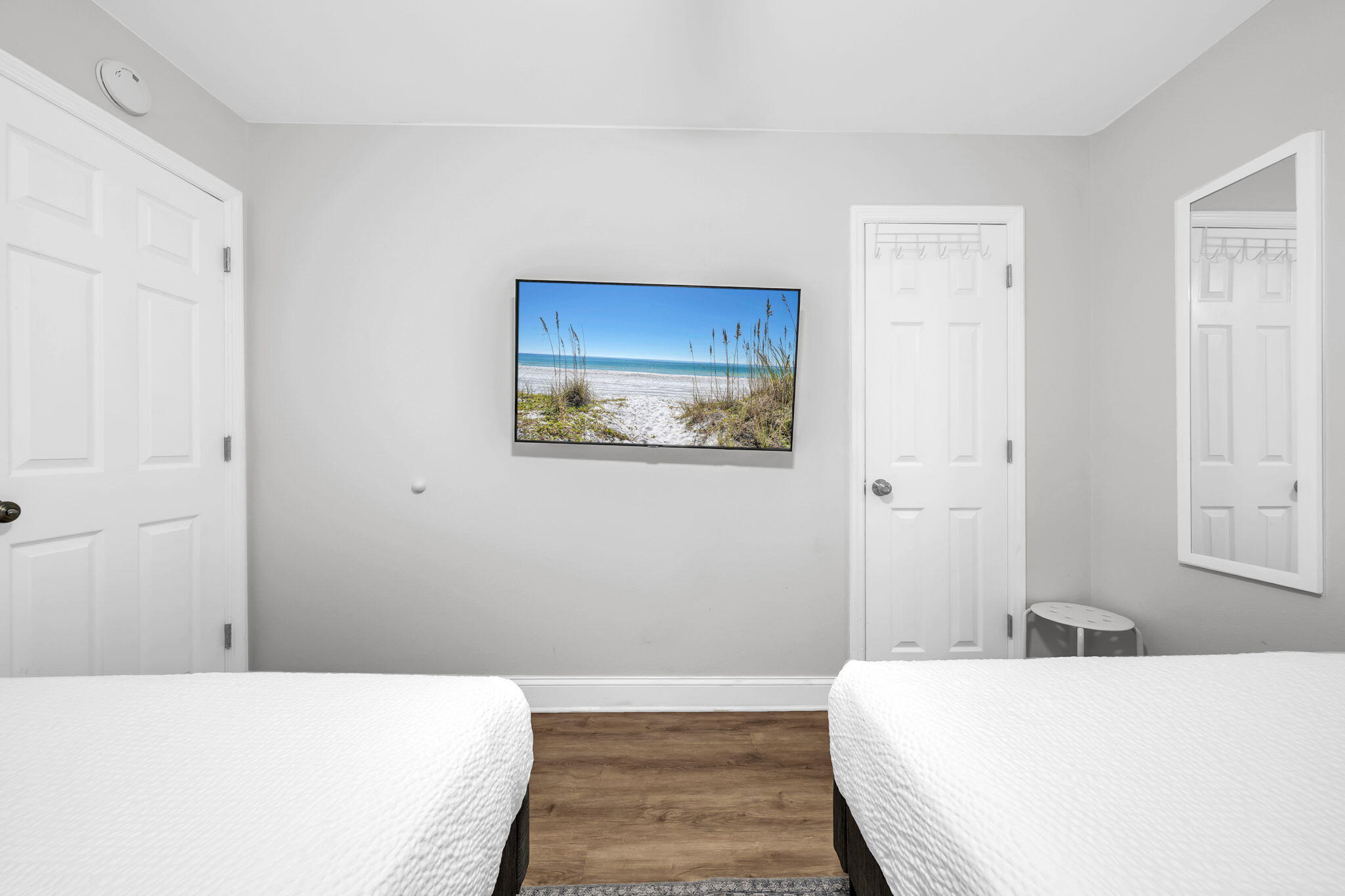 11 Beachside Drive, Unit 131 Santa Rosa Beach, FL 32459 - Photo 11 of 25 a bedroom with a bed and a painting on the wall