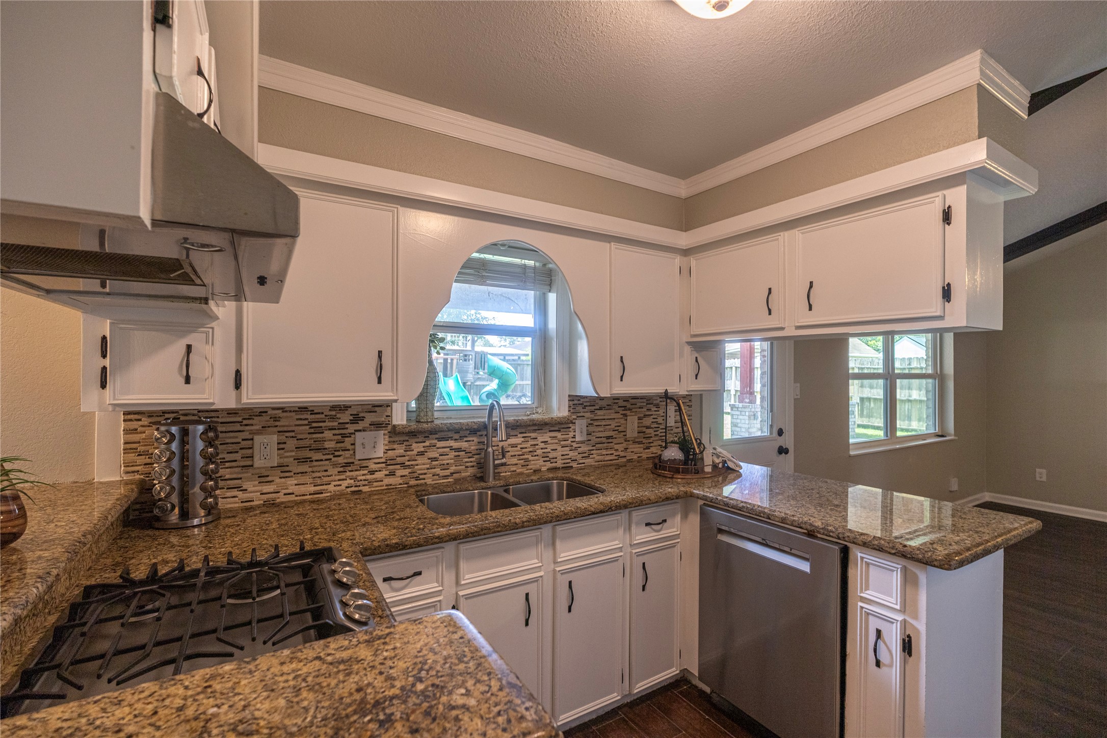 14419 Wadebridge Way Houston, TX 77015 - Photo 3 of 20 Imagine yourself cooking in this updated kitchen while looking through the window to the playground and backyard.