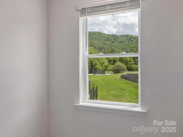 a view of a room that has a window