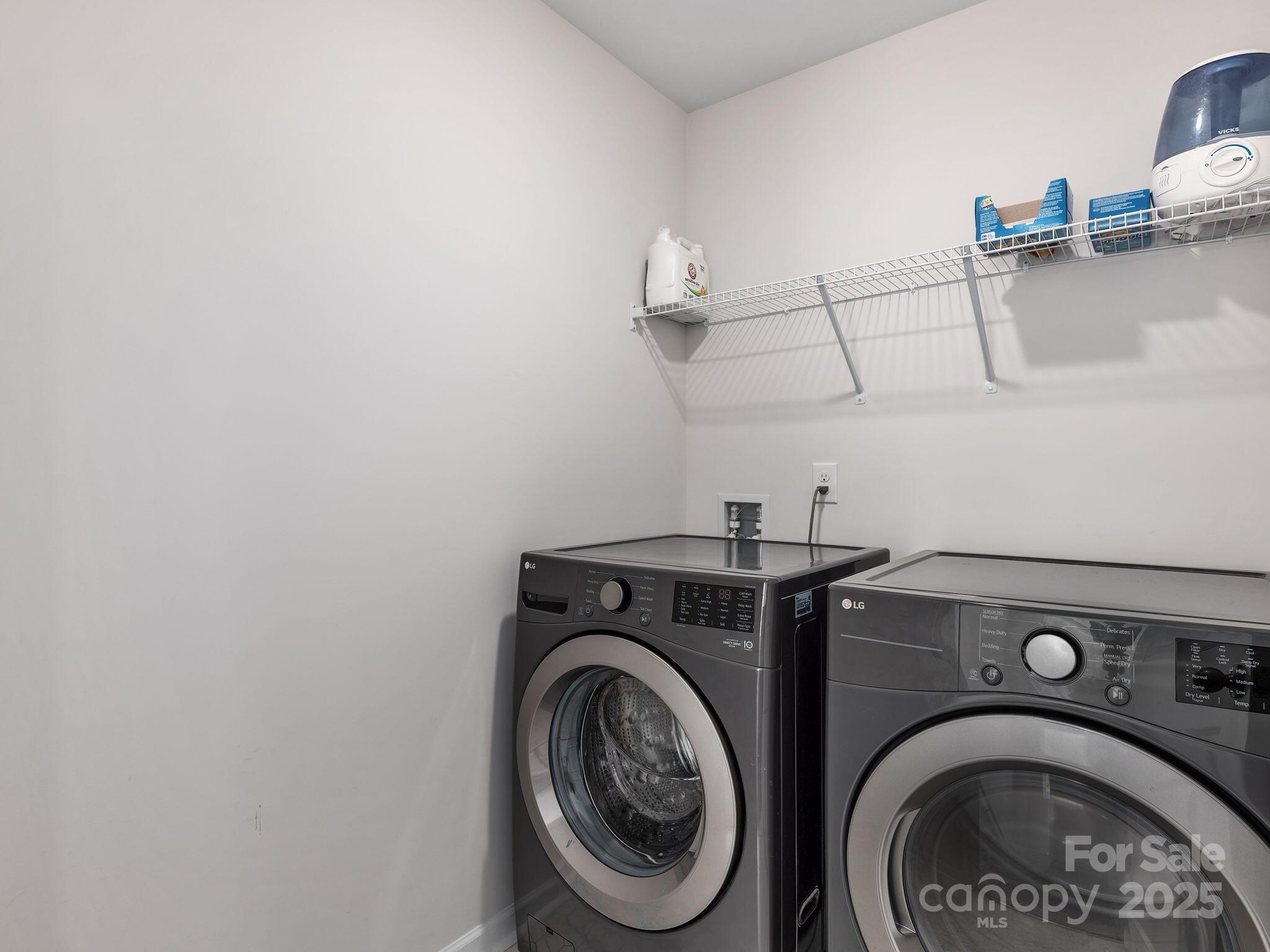 8 Madelyn Drive Clyde, NC 28721 - Photo 22 of 34 a utility room with dryer and washer