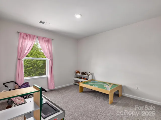 a room with toys and windows