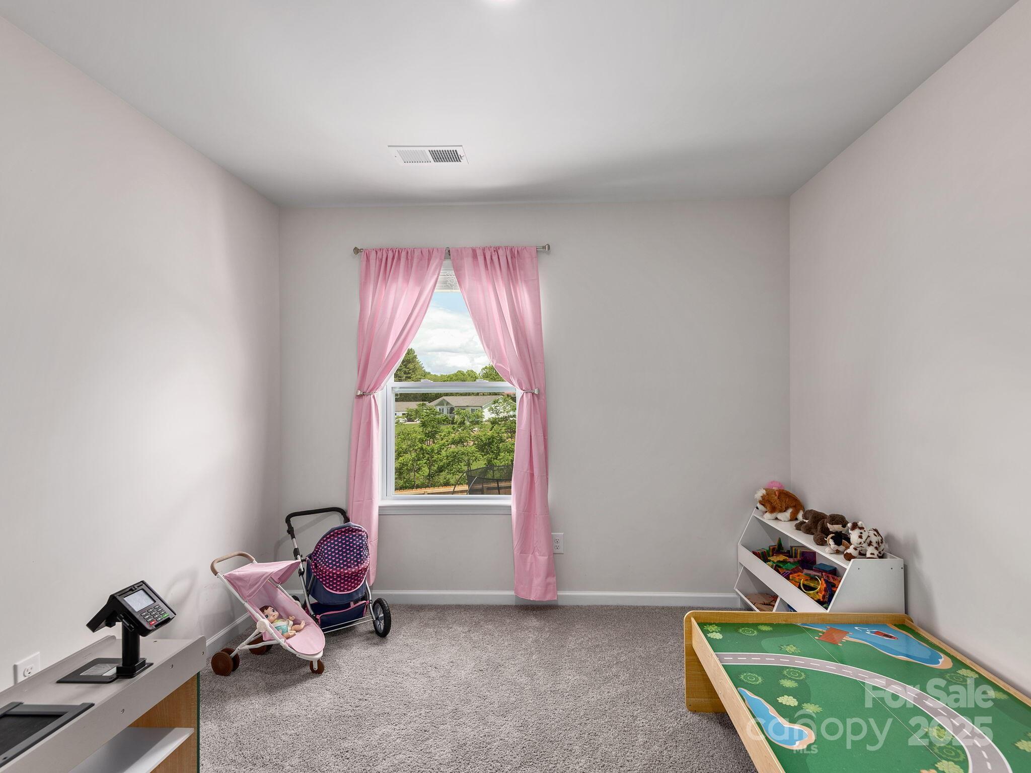 8 Madelyn Drive Clyde, NC 28721 - Photo 24 of 34 a living room with furniture and a window