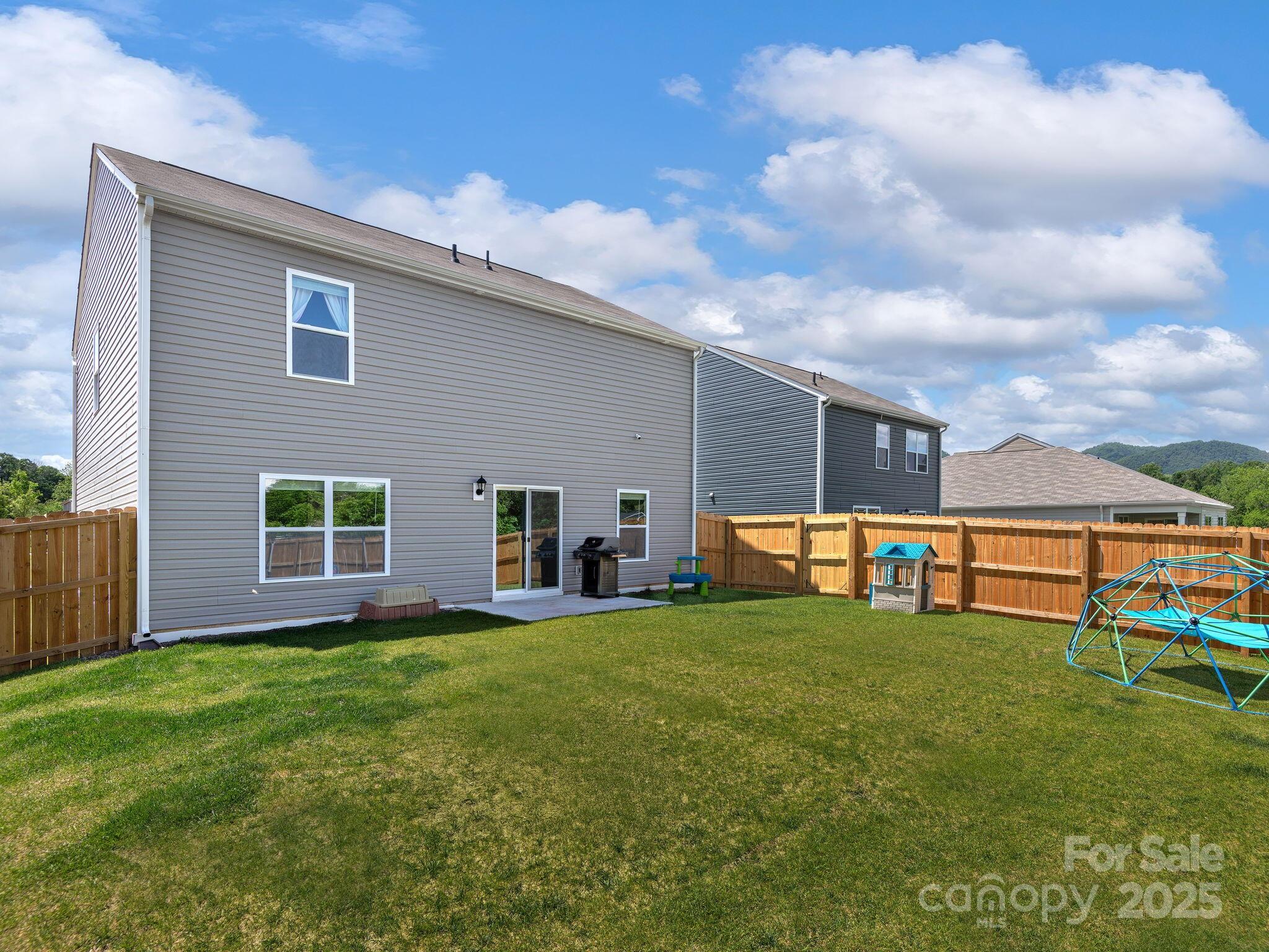 8 Madelyn Drive Clyde, NC 28721 - Photo 27 of 34 a view of a house with a yard and sitting area