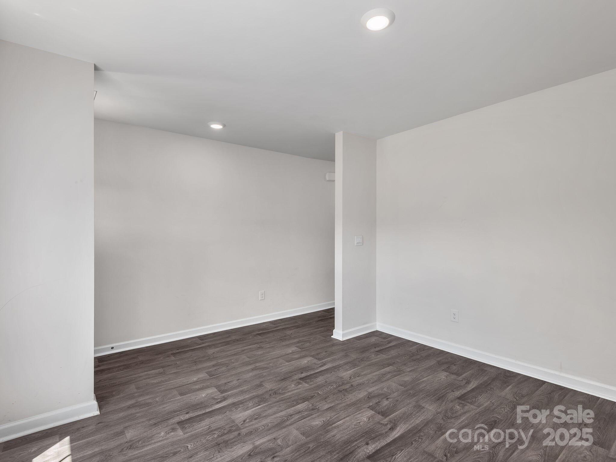 8 Madelyn Drive Clyde, NC 28721 - Photo 5 of 34 a view of an empty room with wooden floor