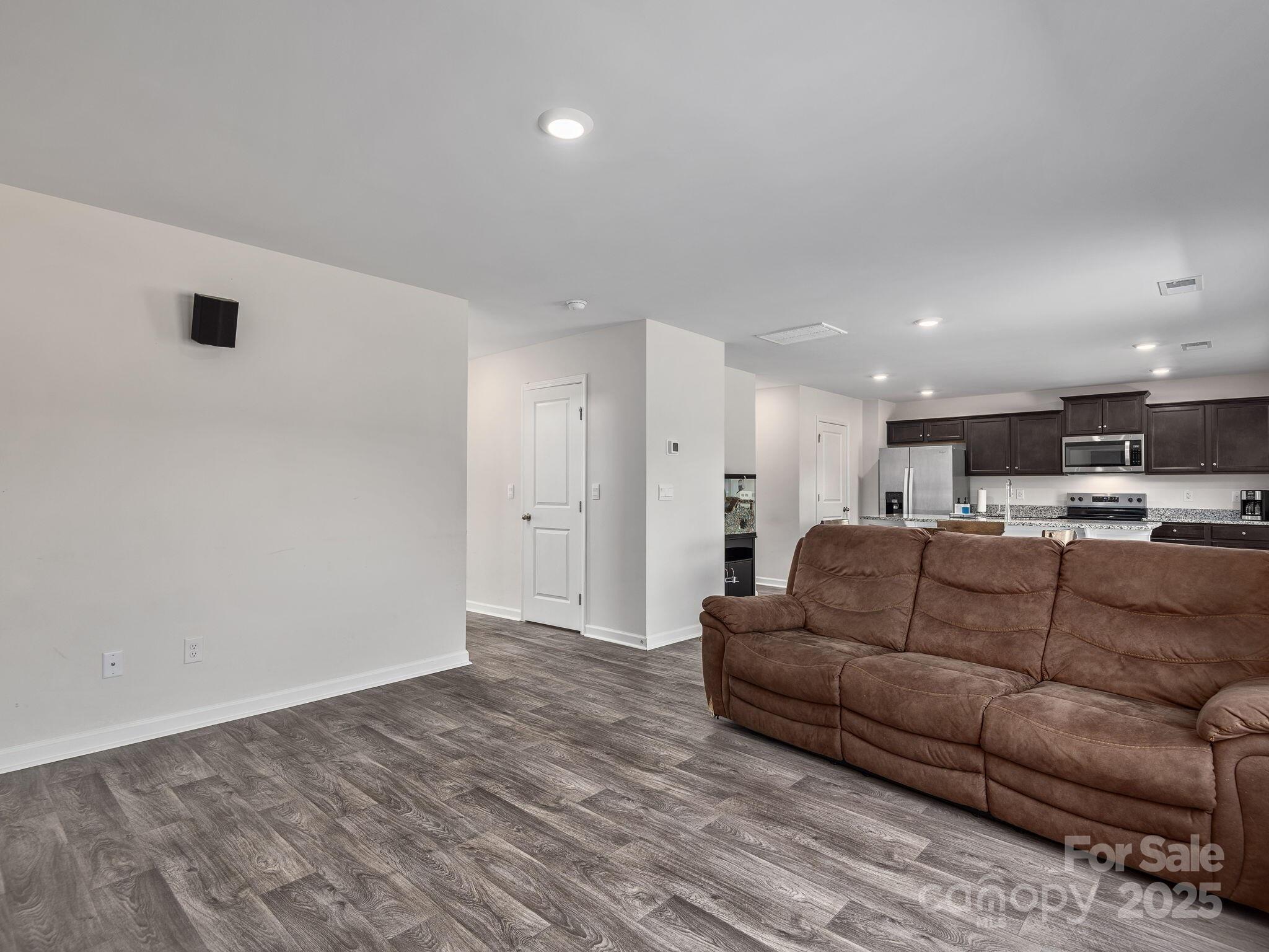 8 Madelyn Drive Clyde, NC 28721 - Photo 8 of 34 a living room with furniture and kitchen view