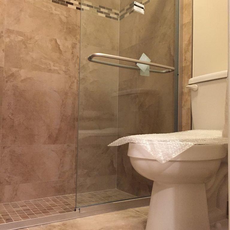 9182 Gettysburg Road Boca Raton, FL 33434 - Photo 11 of 23 a bathroom with a sink and shower