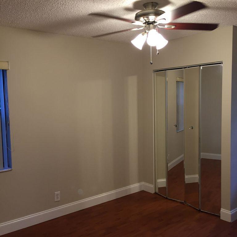 9182 Gettysburg Road Boca Raton, FL 33434 - Photo 17 of 23 wooden floor in an empty room