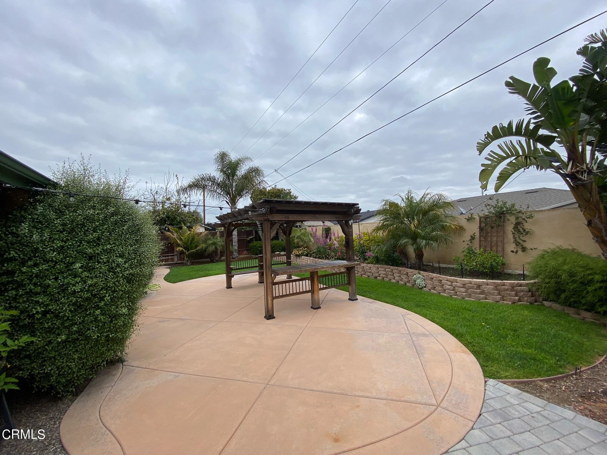 2046 Koala Way Ventura, CA 93003 - Photo 23 of 29 a park view with a bench and trees