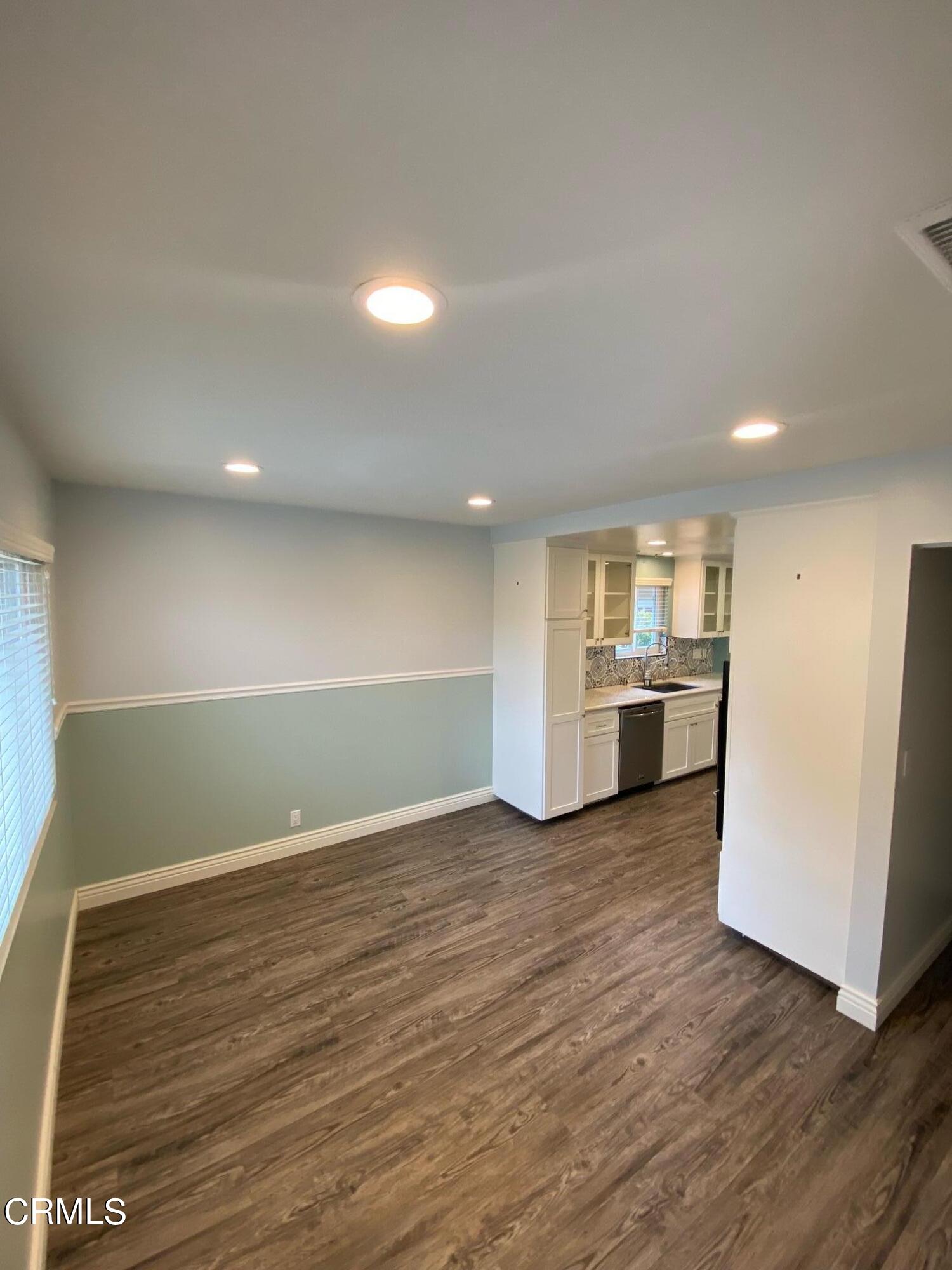 2046 Koala Way Ventura, CA 93003 - Photo 5 of 29 a view of kitchen and wooden floor
