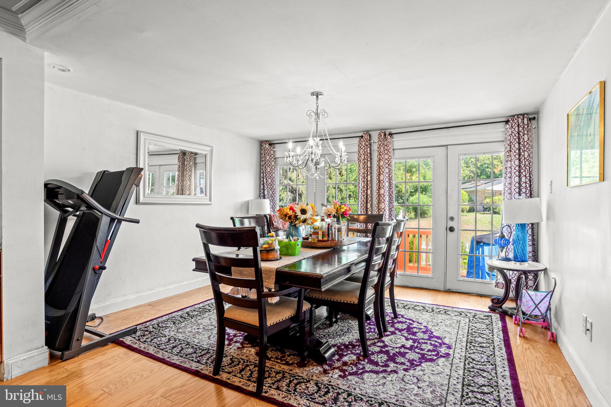 3404 Ridgeway Road Harrisburg, PA 17109 - Photo 12 of 29 a view of a dining room with furniture window and wooden floor