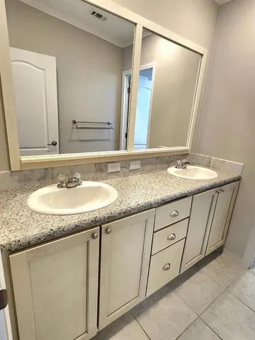 a bathroom with a bath tub