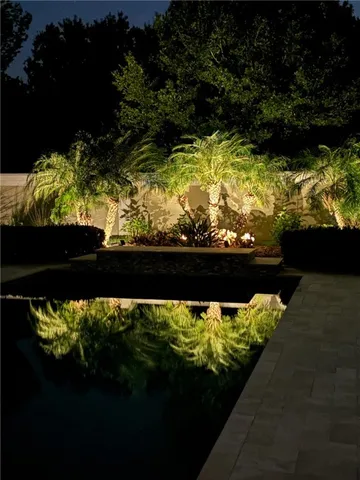 a view of swimming pool from a balcony
