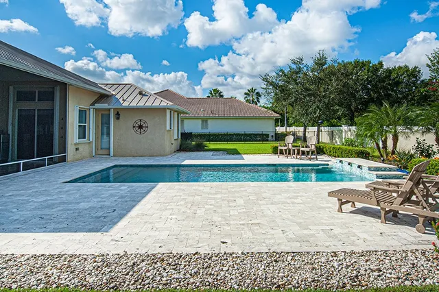 a view of a house with a swimming pool