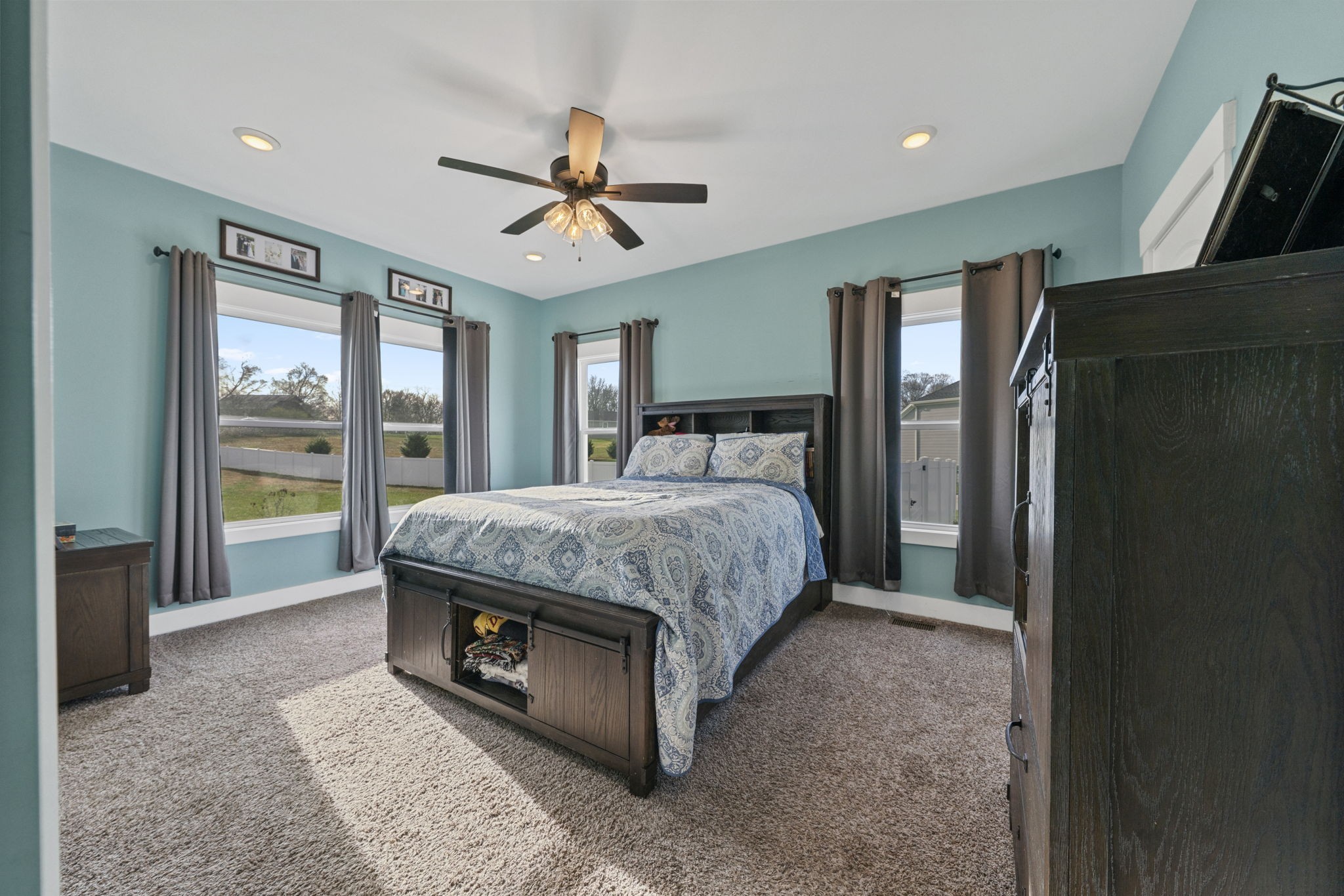 2086 Beverly Court Springfield, TN 37172 - Photo 17 of 39 a spacious bedroom with a bed and glass door