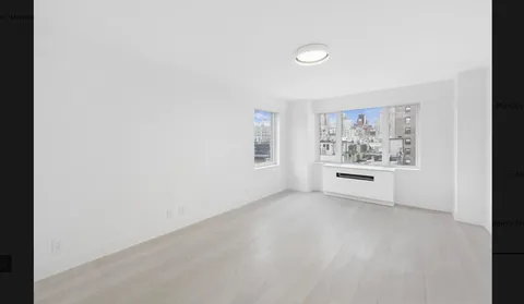 a view of a bedroom with a hallway