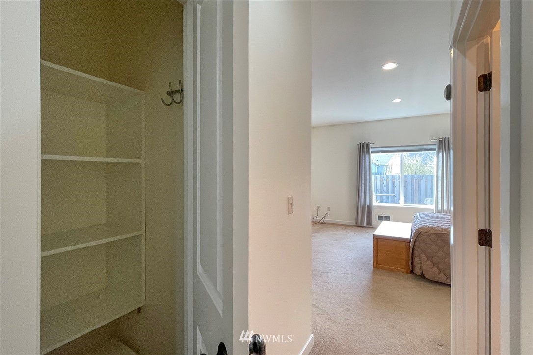 20 Stratus Loop Sequim, WA 98382 - Photo 25 of 40 a view of a bedroom with a bed and a window