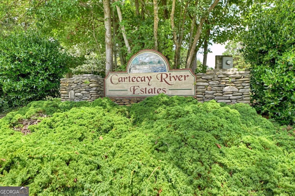 Lot 10 Cartecay Riv Run Ellijay, GA 30536 - Photo 2 of 17 a view of a sign in a garden