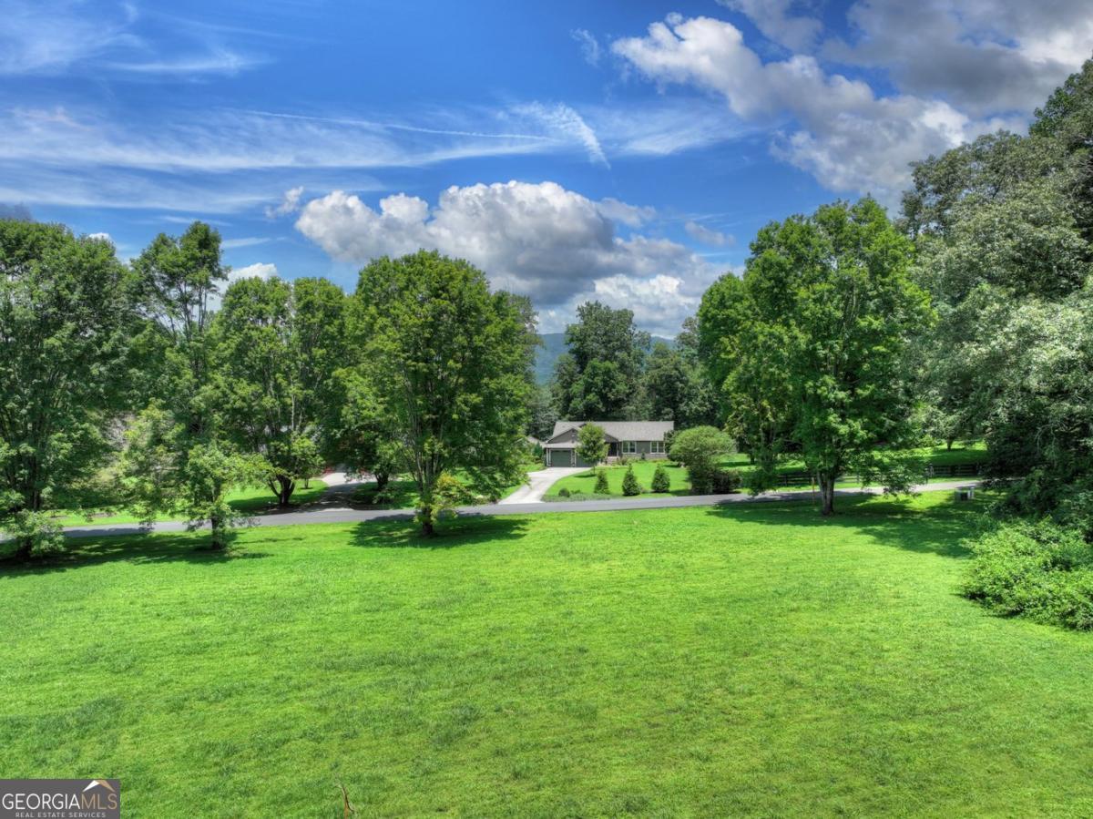 Lot 10 Cartecay Riv Run Ellijay, GA 30536 - Photo 10 of 17 a view of a big yard with a house in the background