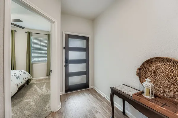 a room with a table and chairs