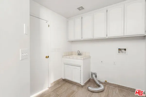 a room with storage and utility