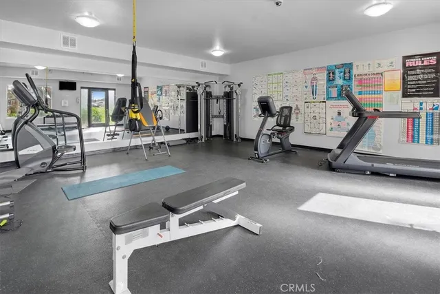 a view of a room with gym equipment