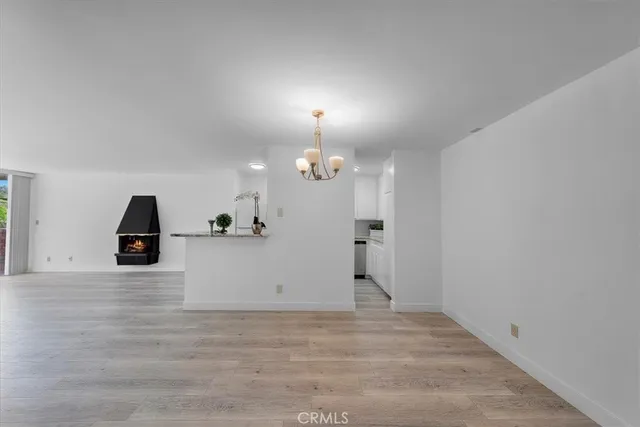 a view of a kitchen with a sink