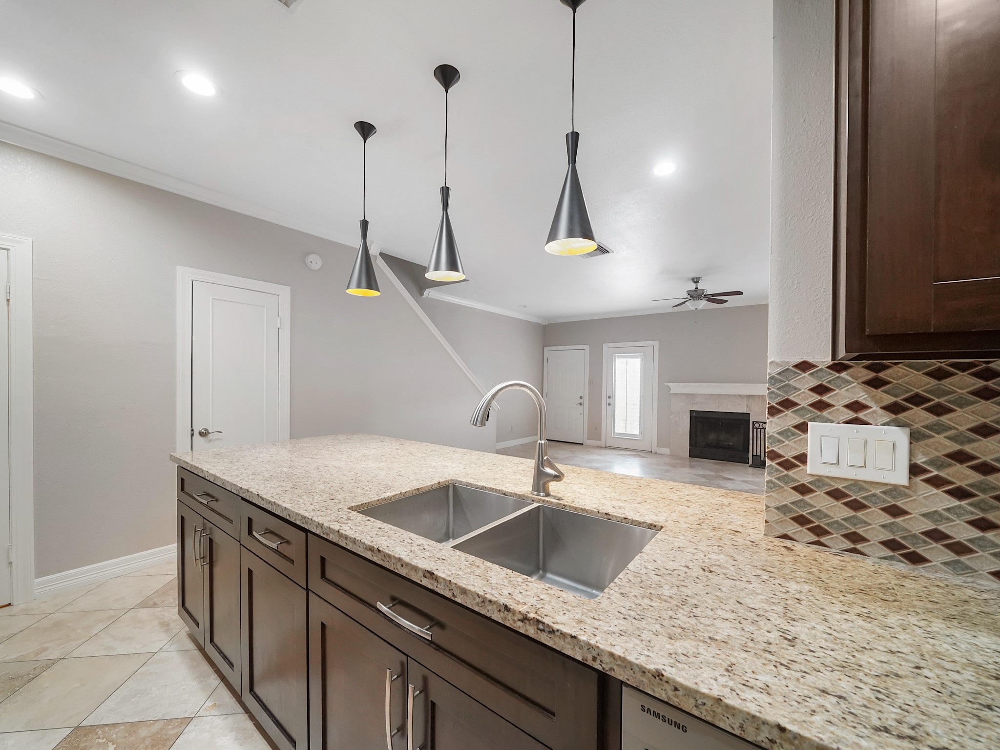 6000 Reims Road, Unit 2205 Houston, TX 77036 - Photo 12 of 35 Expansive kitchen sink with modern design and utility.