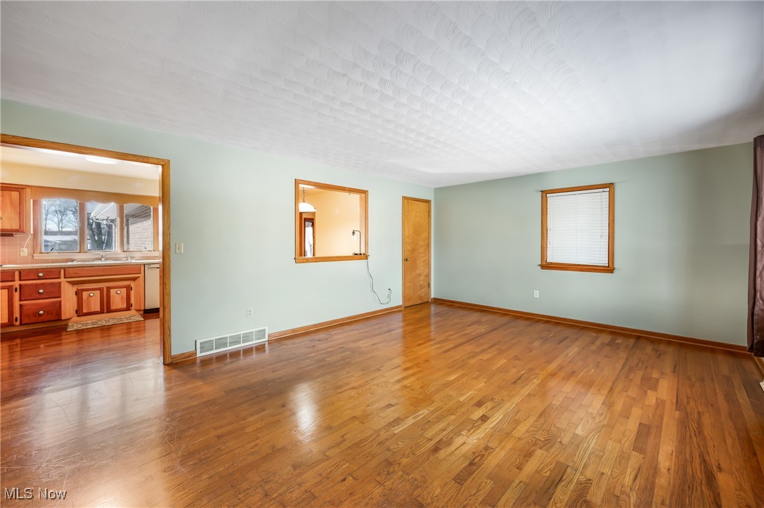 3210 Oser Road Norton, OH 44203 - Photo 14 of 47 Empty room featuring hardwood / wood-style flooring