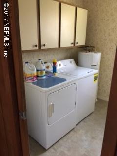 4724 Dundee Road Jacksonville, FL 32210 - Photo 13 of 16 a utility room with dryer and washer