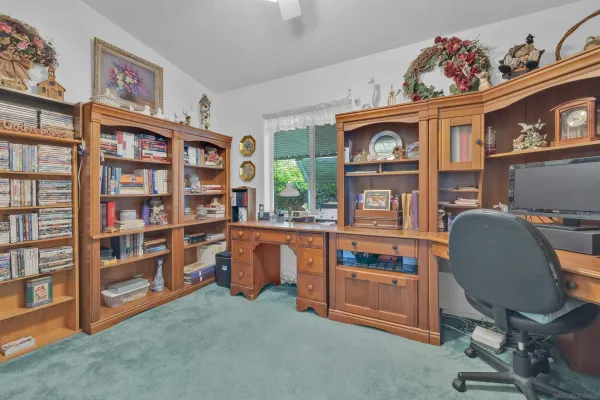 a view of living room filled with furniture and furniture