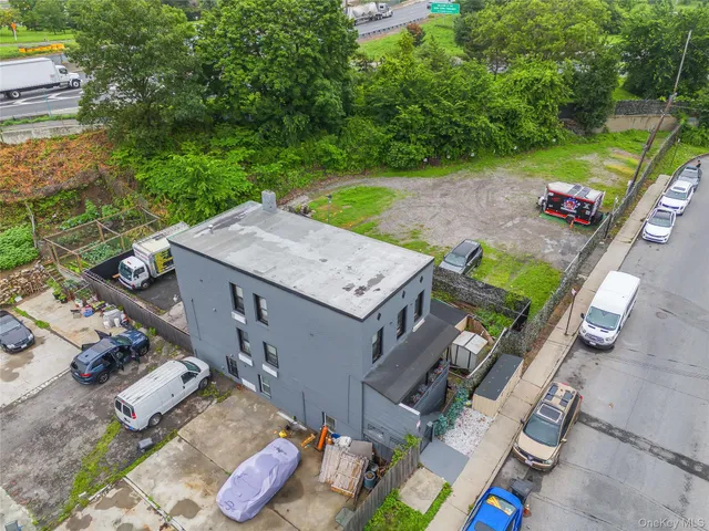an aerial view of a house and outdoor space