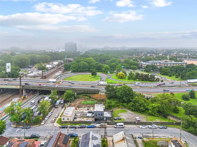 a picture of a bench in front of a wall