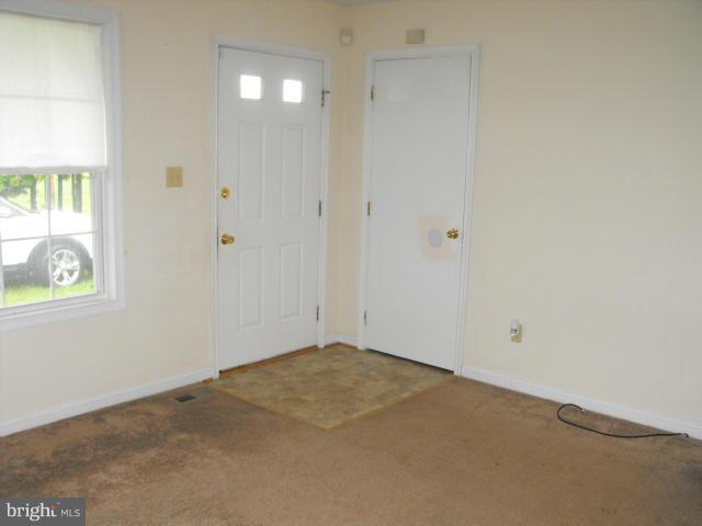 145 Cove Point Road Lusby, MD 20657 - Photo 2 of 13 a view of an empty room