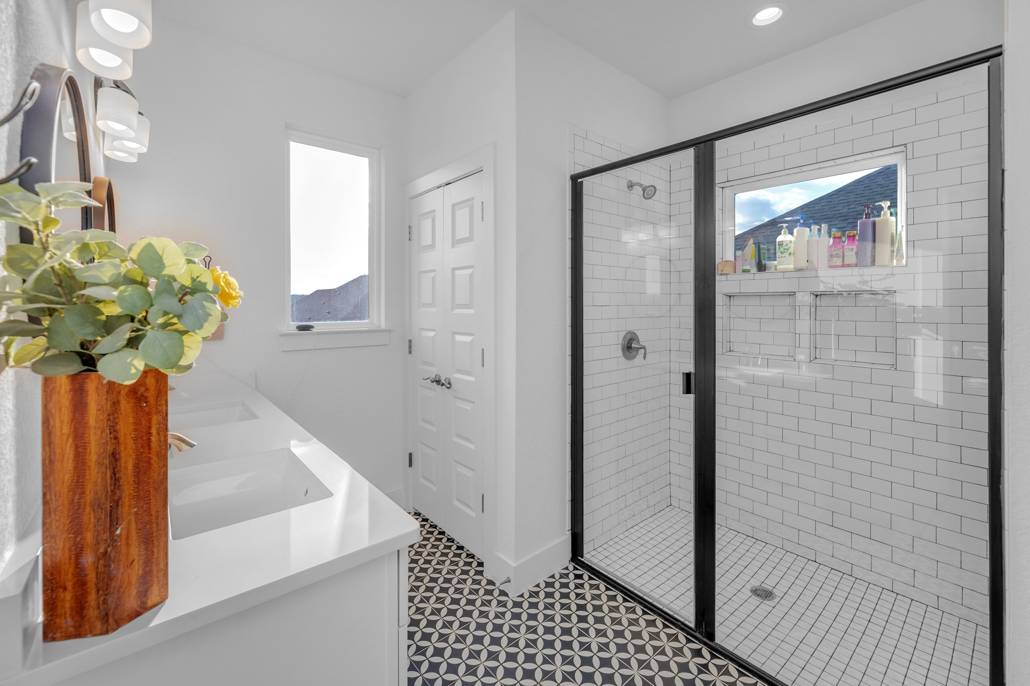 16512 Fetching Avenue Manor, TX 78653 - Photo 23 of 39 Full bath featuring double vanity, recessed lighting, a stall shower, and a sink