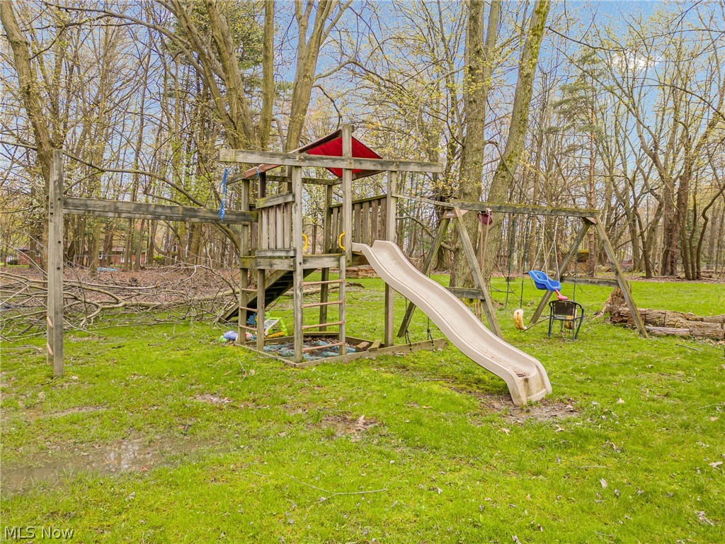 23816 Harms Road Cleveland, OH 44143 - Photo 10 of 11 View of play area featuring a lawn