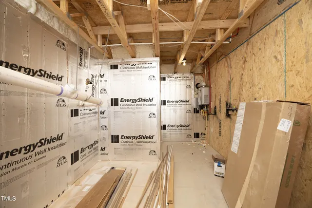a bathroom with double vanity and a bathtub