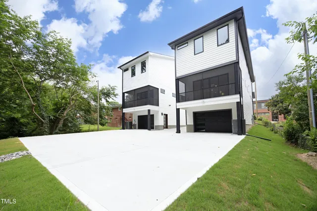 a view of house with yard and entertaining space