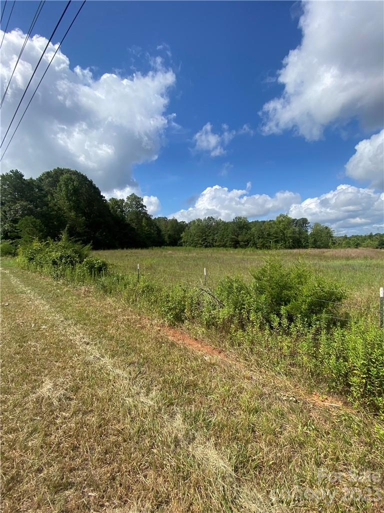 704 Kelly Road, Unit 6 York, SC 29745 - Photo 5 of 5 a view of a lake with a yard