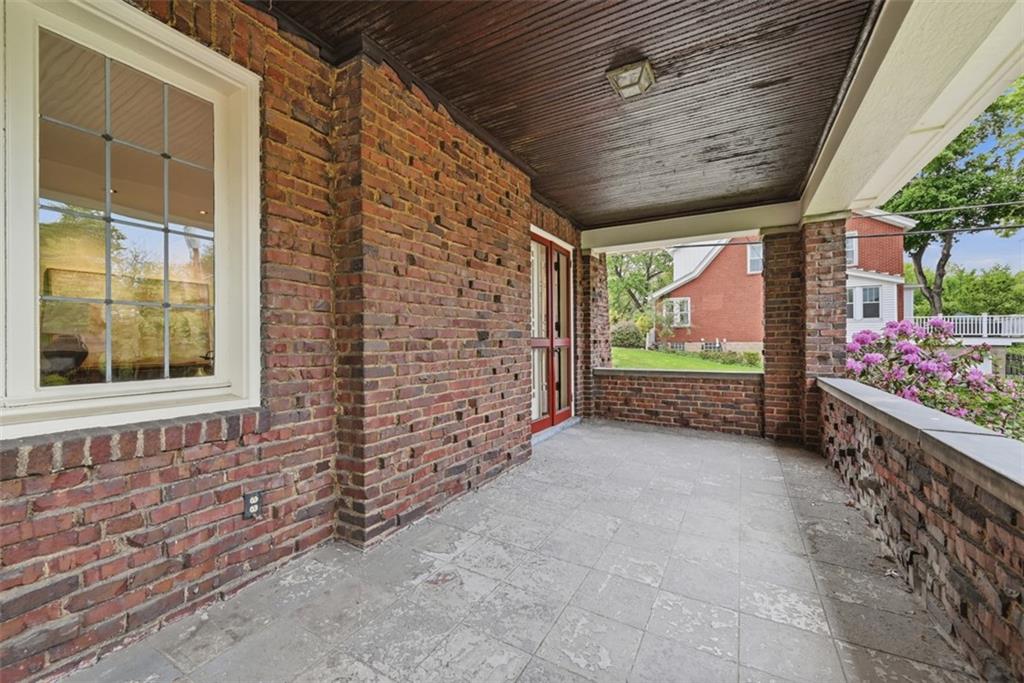 900 Wellesley Road Pittsburgh, PA 15206 - Photo 21 of 48 Step from the Living Room to the Private Covered Side Porch