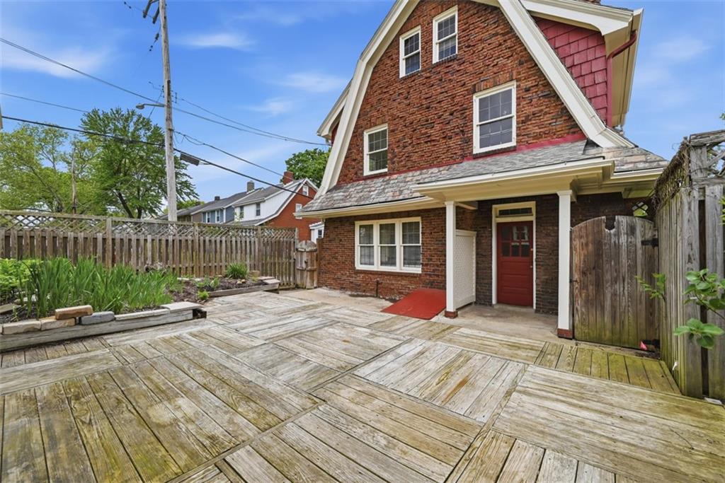900 Wellesley Road Pittsburgh, PA 15206 - Photo 41 of 48 Step Right Out to the Expansive Deck into the Fenced-In Back Yard!
