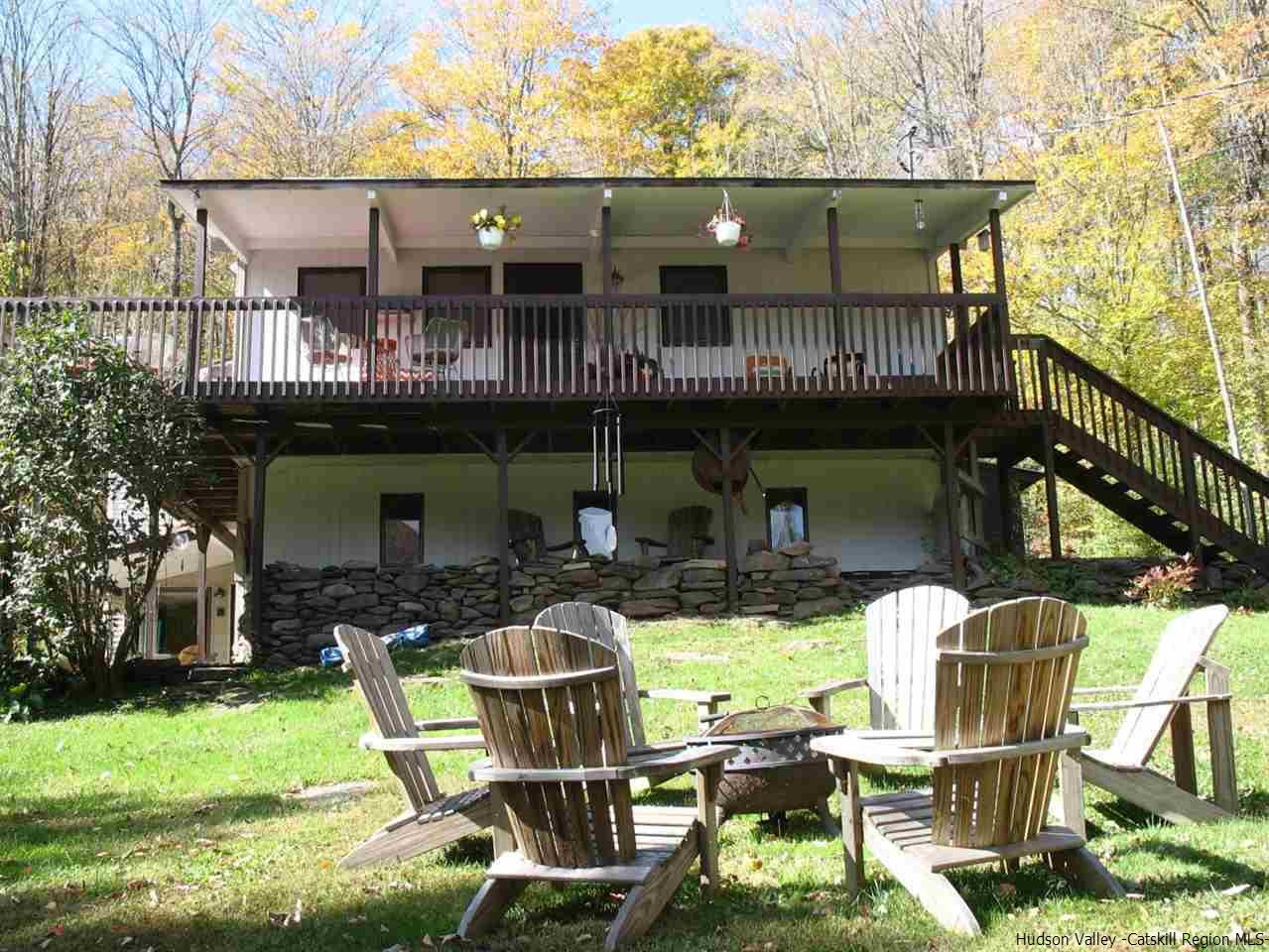 985 Cold Spring Road Roxbury, NY 12474 - Photo 4 of 35 front view of a house with a patio