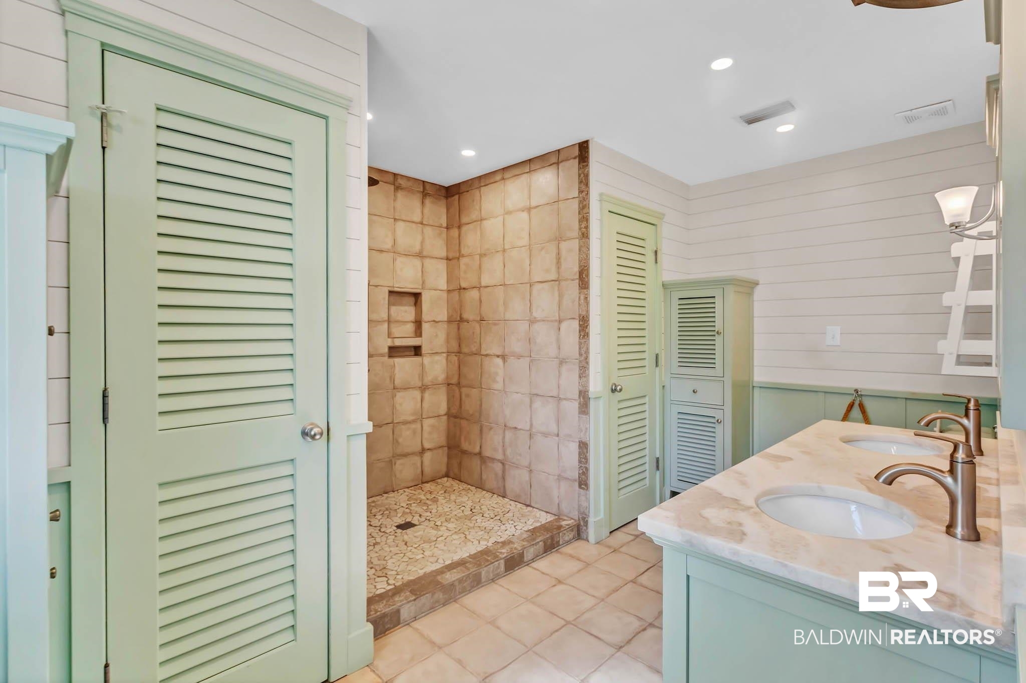 9607 Czar Court Fairhope, AL 36532 - Photo 20 of 42 Bathroom featuring a closet, double vanity, tiled shower, recessed lighting, and tile patterned floors